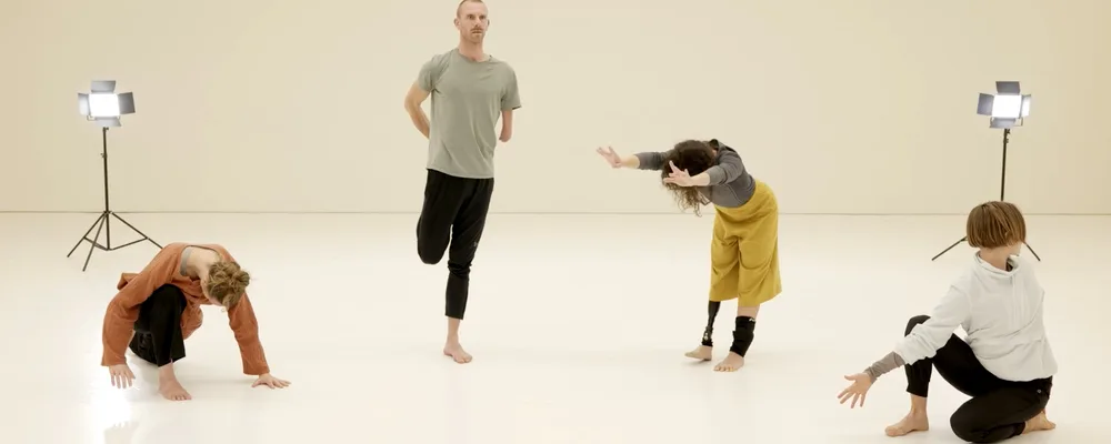 Four dancers from Candoco Dance Company