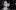 A black and white photo of Albert Quesada smiling
