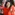 A group of older women dancers all wearing red tops and accessories, dancing on The Dance Floor at Sadler's Wells East