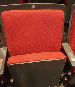 A photo of the red auditorium seat at Sadler's Wells Theatre